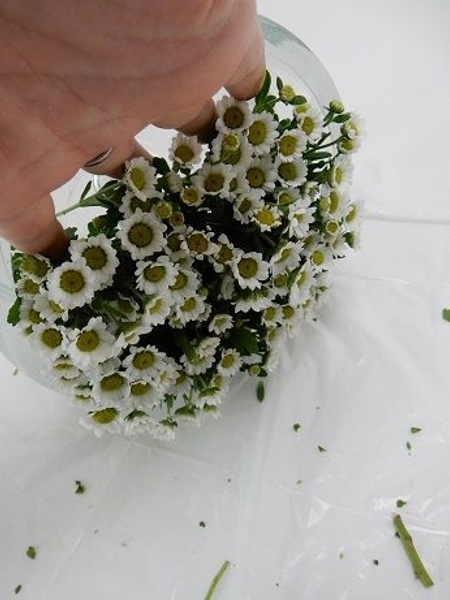 Fill just over 3/4 of the vase with flowers Fill just over 3/4 of the vase with flowers