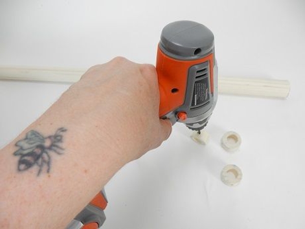 Drill a hole in the side of the Dowel slice Drill a hole in the side of the Dowel slice