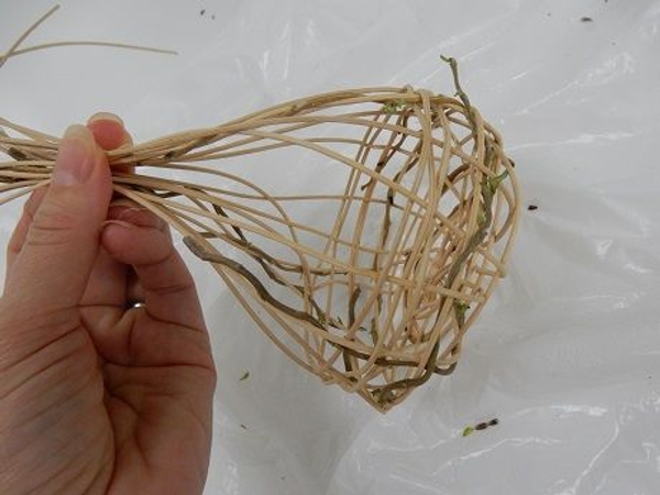 Fold the long strand up and gather with the rest of the side strands Fold the long strand up and gather with the rest of the side strands