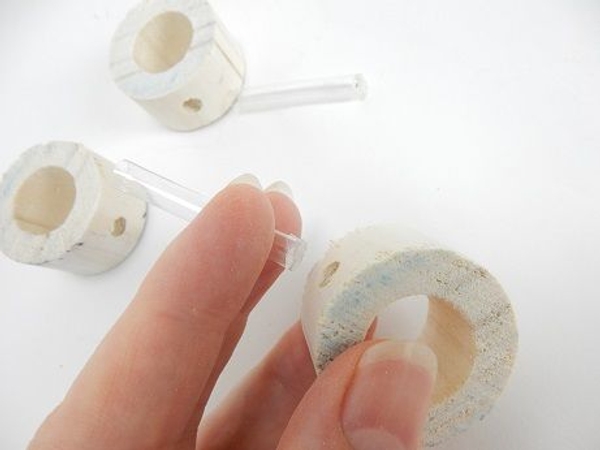 Slip the tiny drinking straw into the hole Slip the tiny drinking straw into the hole