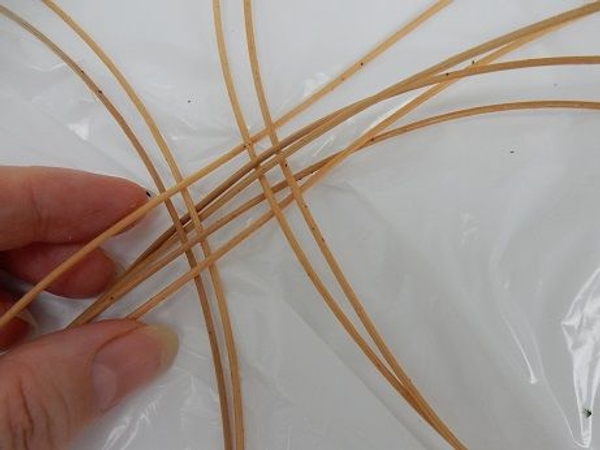 Weave in the long strand Weave in the long strand