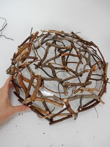 Continue to add twigs to cover the entire shape Continue to add twigs to cover the entire shape