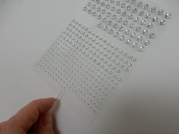Pick the crystal up with a pin Pick the crystal up with a pin