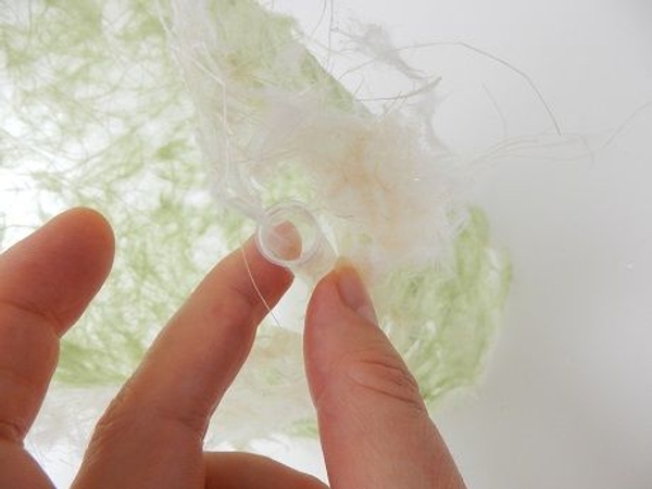 Slip the tiny straw test tubes between the top layers of Washi paper Slip the tiny straw test tubes between the top layers of Washi paper