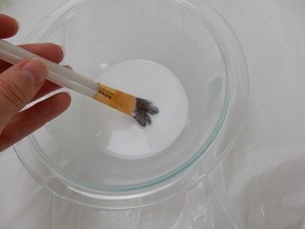 Thin some white wood glue with warm water Thin some white wood glue with warm water