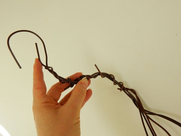 Curve the top wire to gibve it a hook Curve the top wire to gibve it a hook