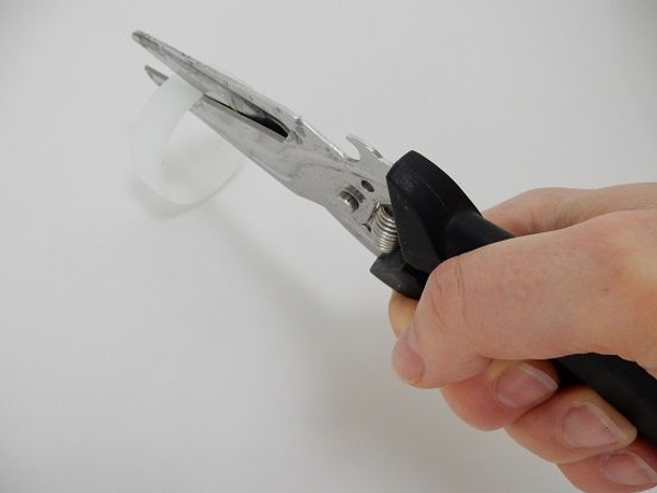 Cut the plastic inner from a floral tape open Cut the plastic inner from a floral tape open