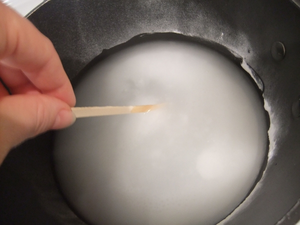 Dissolve the sodium carbonate. Dissolve the sodium carbonate.