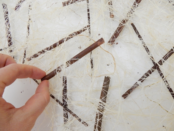 And pin a new layer of twigs And pin a new layer of twigs
