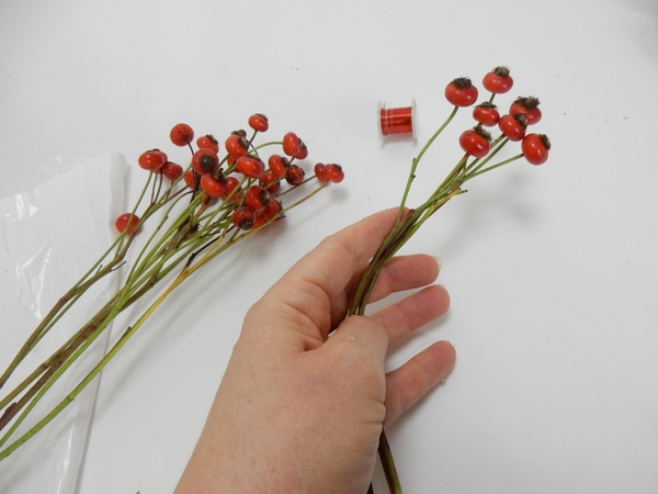 Bend the rosehip stems to make it more pliable and easier to weave with Bend the rosehip stems to make it more pliable and easier to weave with