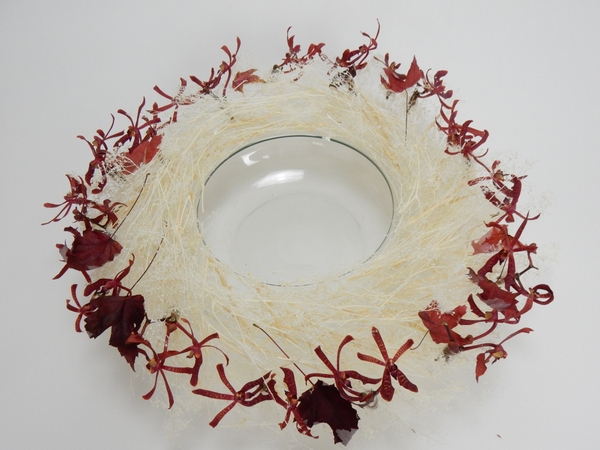 Bleached Gypsophila and Mokara Orchid table top wreath Bleached Gypsophila and Mokara Orchid table top wreath