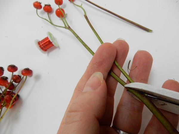 Cut away the thinner side shoots to weave back in later Cut away the thinner side shoots to weave back in later