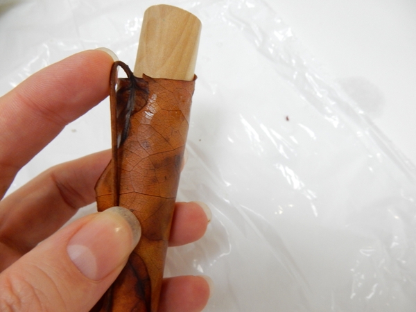Fold the stem over to curve back. Fold the stem over to curve back.