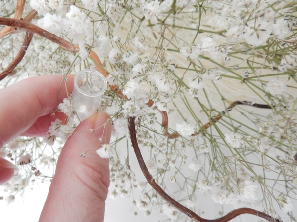 Glue in the test tubes for the fresh flowers