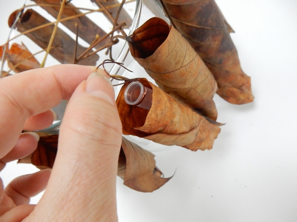 Place a tiny water source in the leaf tube for the fresh flowers