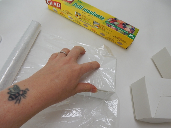 Cover the boxes with cling film Cover the boxes with cling film