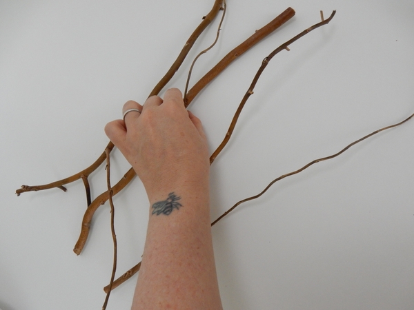 Add another twig and make sure to glue it to three other twigs. Add another twig and make sure to glue it to three other twigs.
