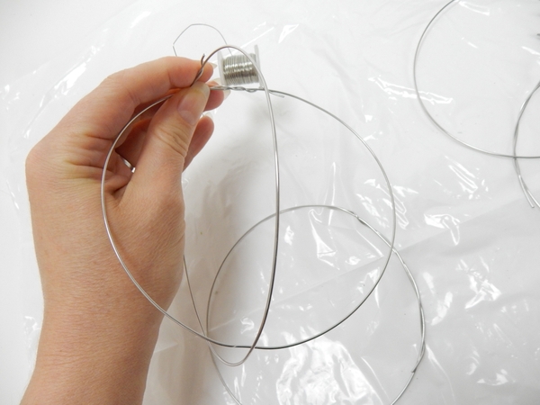 Slip the first ring over the second and secure with wire Slip the first ring over the second and secure with wire