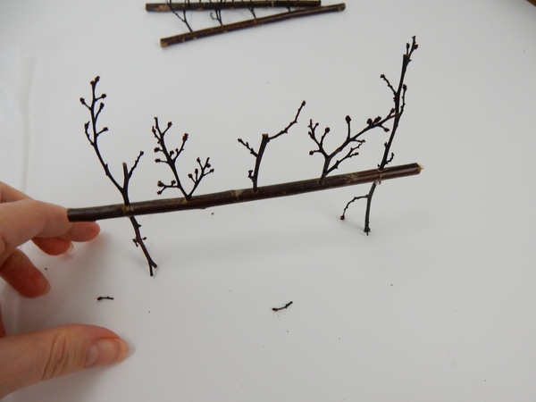 And another stick on the other end to create legs And another stick on the other end to create legs