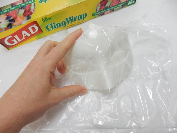 Cover a mask shape with cling wrap Cover a mask shape with cling wrap