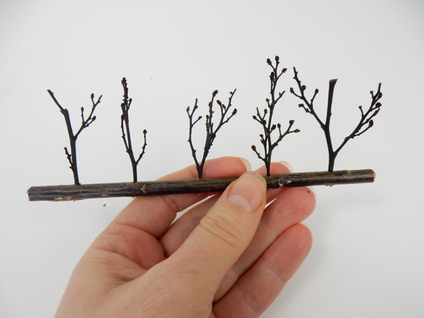 Twist the sticks so that it faces the same direction Twist the sticks so that it faces the same direction