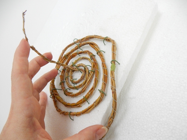 And spiral the willow twig garland back in And spiral the willow twig garland back in
