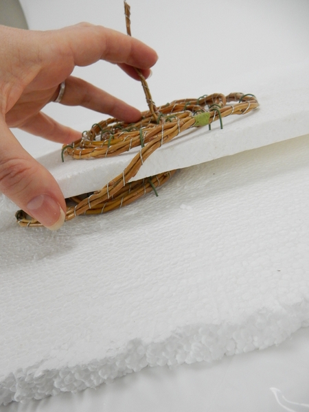 Place the two Styroofoam sheets on top of each other and set aside for the twigs to dry Place the two Styroofoam sheets on top of each other and set aside for the twigs to dry