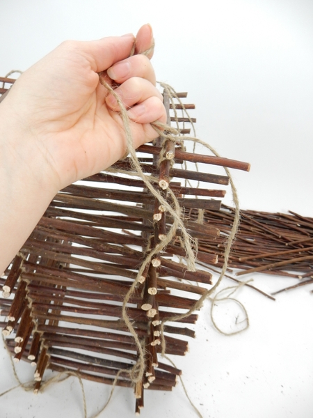 Stack the last twig and knot the string Stack the last twig and knot the string