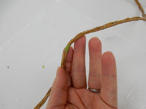 The one half of the garland is wrapped clockwise and the other counter clockwise The one half of the garland is wrapped clockwise and the other counter clockwise