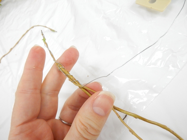 Wrap the wire back down and around the begin point of the wire to secure Wrap the wire back down and around the begin point of the wire to secure