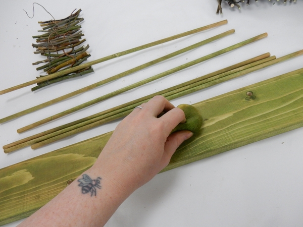 Continue to build up the colour of both the dowel sticks and the lumber layer by layer so that you can still see the grain of the wood Continue to build up the colour of both the dowel sticks and the lumber layer by layer so that you can still see the grain of the wood