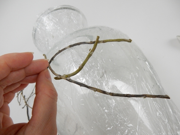 Glue twig snippets to closely follow the shape Glue twig snippets to closely follow the shape