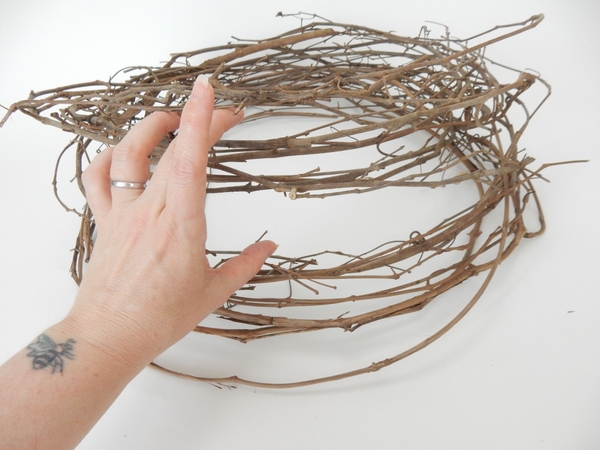 Work your way through the the twigs to loosen it up Work your way through the the twigs to loosen it up