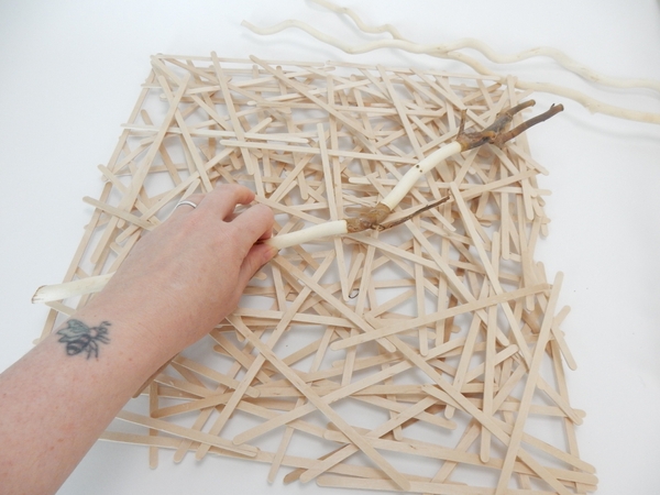 Glue in a partially stripped willow stick Glue in a partially stripped willow stick