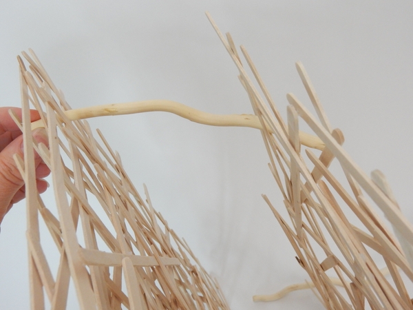 Keep adding sticks to secure the two armatures Keep adding sticks to secure the two armatures