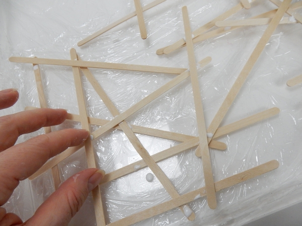 To create dimension built the sticks so that it rests both over and under the other sticks To create dimension built the sticks so that it rests both over and under the other sticks