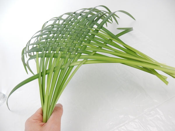 Carefully lift the woven grass as a unit Carefully lift the woven grass as a unit