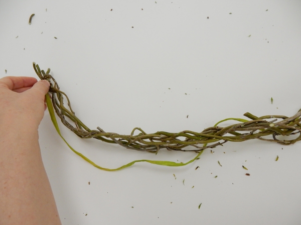 Measure the ribbon against the plaited willow to see if it is long enough Measure the ribbon against the plaited willow to see if it is long enough