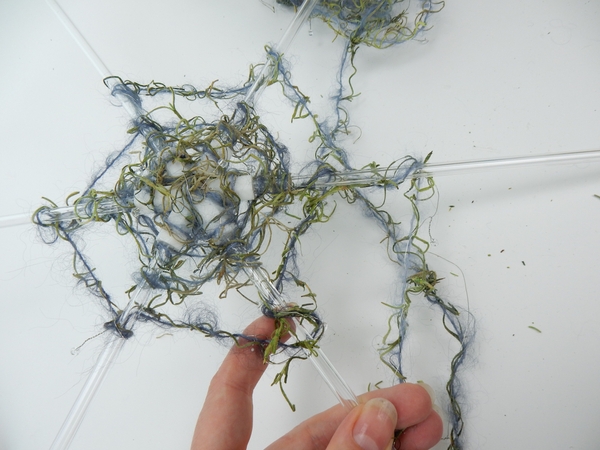 Spiral and wrap the rods with the wool Spiral and wrap the rods with the wool