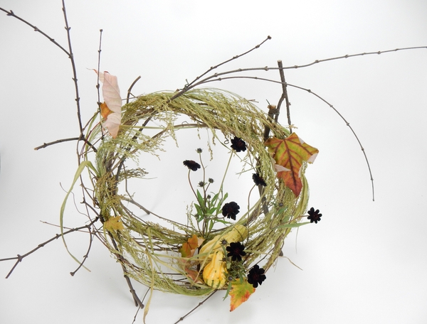Chocolate cosmos, pumpkins, autumn leaves and grass Chocolate cosmos, pumpkins, autumn leaves and grass