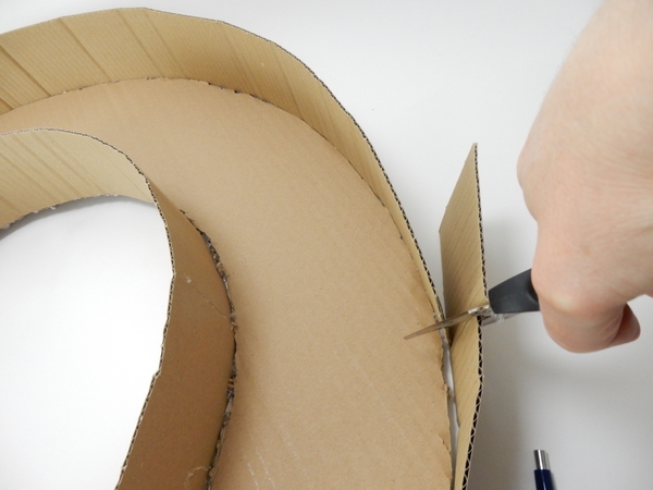Cut away any leftlover cardboard and glue to secure the shape Cut away any leftlover cardboard and glue to secure the shape