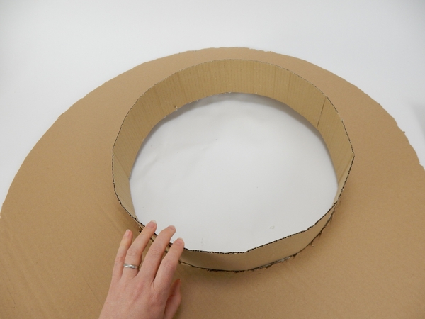 Cut away any leftover strip and glue the shape closed Cut away any leftover strip and glue the shape closed