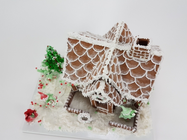 Fresh frosting on the gingerbread house