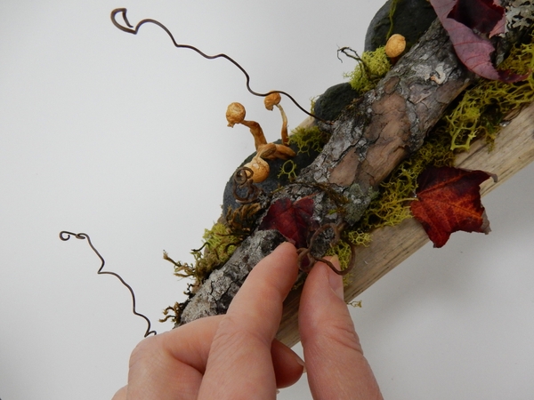 Glue in a few grapevine tendrils and autumn leaves Glue in a few grapevine tendrils and autumn leaves