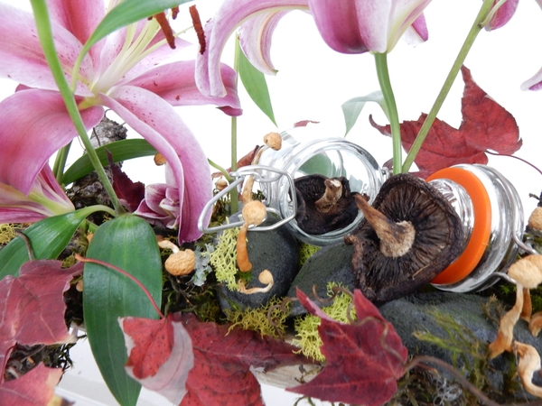 Mushroom and moss with autumn leaves and lilies Mushroom and moss with autumn leaves and lilies