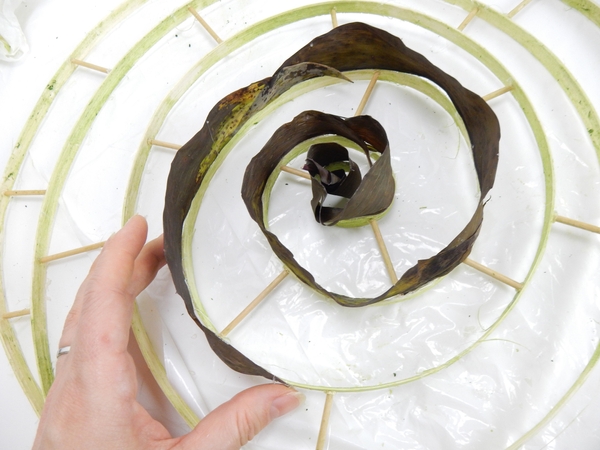 Slightly overlap the leaves to cover the entire spiral Slightly overlap the leaves to cover the entire spiral