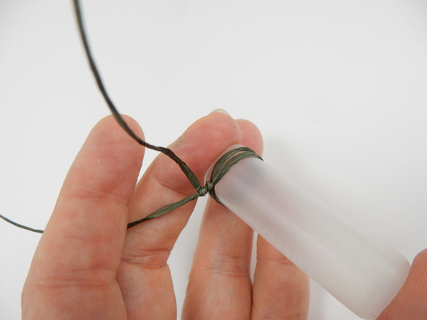 Twist the bind wire to secure