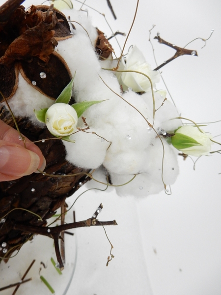 Add dried tendrils and snowflake crystals to finish Add dried tendrils and snowflake crystals to finish