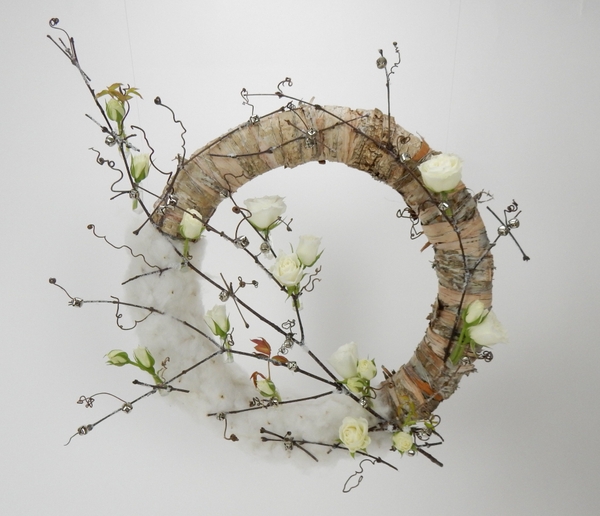 Jingle bell, vine, roses cotton and bark wreath. Jingle bell, vine, roses cotton and bark wreath.