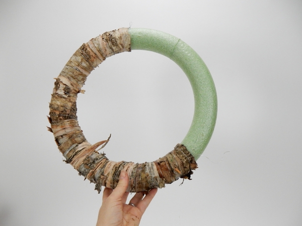 Set the wreath aside to dry overnight Set the wreath aside to dry overnight